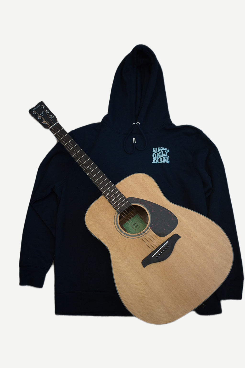 Navy blue hoodie with a guitar design on a white background